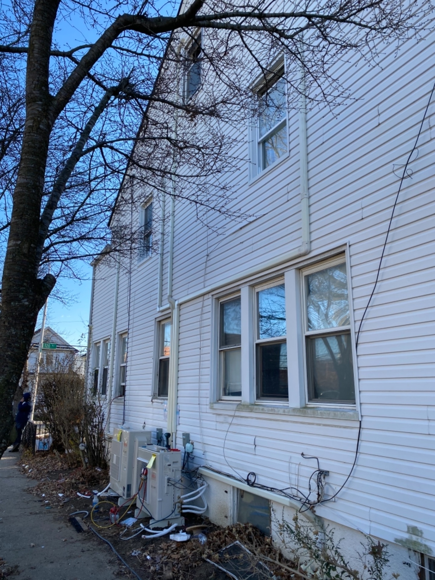 Ductless mini-split condensers installed by HVAC Services and Controls at a Queens home